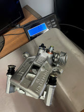Load image into Gallery viewer, Wilwood D154 Rear Caliper Adapter Kit - 94-04 Mustang Base / GT